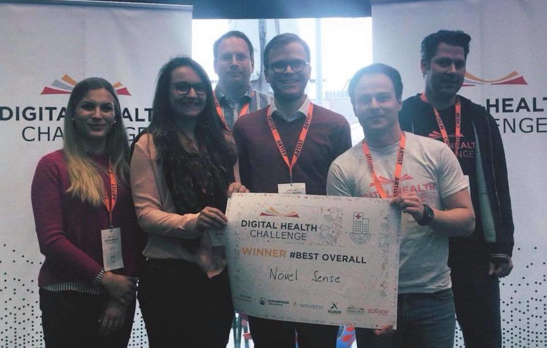 Sascha Rudolph and NovelSense team accepting award for winning a hackathon in Nuremberg